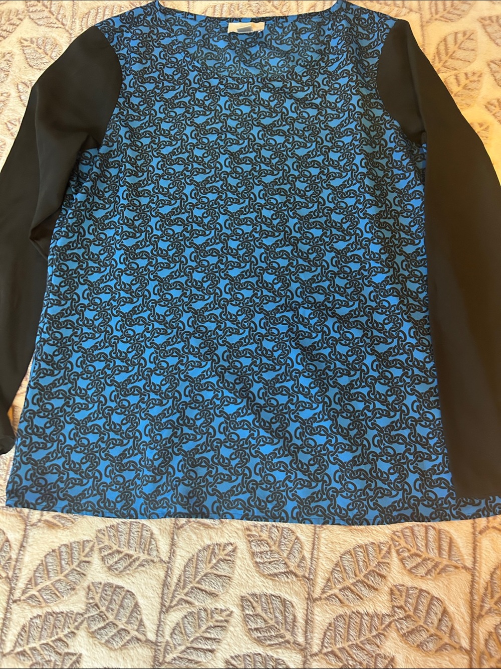 Wrinkle free size med  LOFT Blue Patterned Long-Sleeve Blouse with Black Sleeves